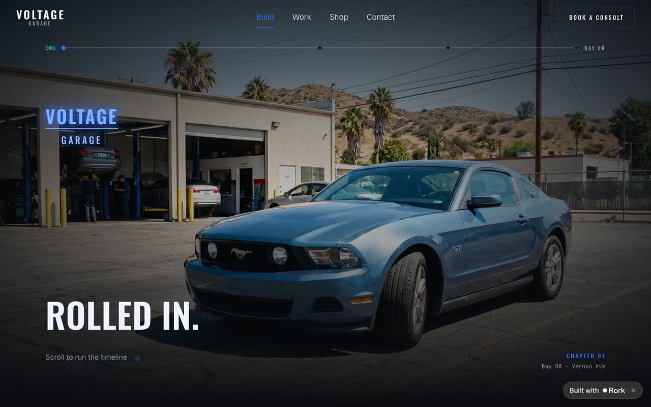Voltage Garage website with a car in the shop bay and a scroll timeline